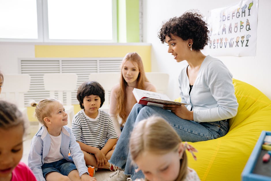 Teacher engaging students at front of classroom
